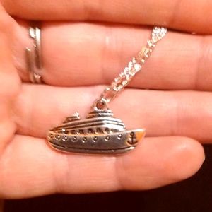 Silver plated cruise ship necklace.